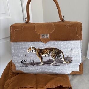 Marquise Paris Suede and Silk top handle bag. Shoulder strap and dust bag.